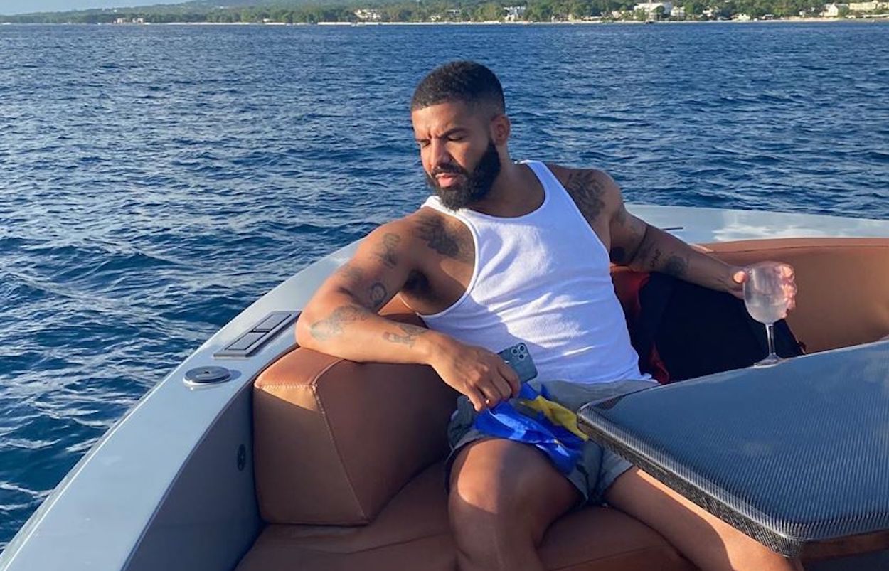 Drake Eats Spaghetti out of his Spotify Plaque Wearing a $2,670 Louis  Vuitton Giant Damier Waves Monogram Denim Jacket – Fashion Bomb Daily
