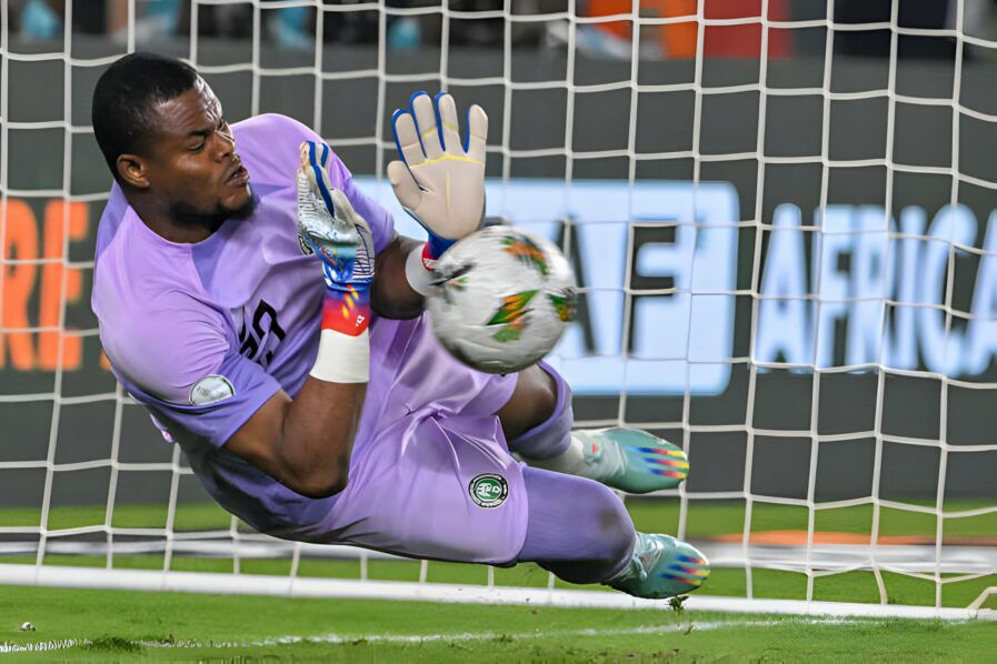 Stanley Nwabali makes a save during the penalty shootout against South Africa. Photo: AFP